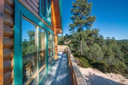 Mountain-View Log Cabin with Wraparound Deck